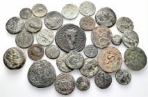 A lot containing 30 bronze coins. All: Roman Provincial. Fine to very fine. LOT SOLD AS IS, NO RETURNS. 30 coins in lot.