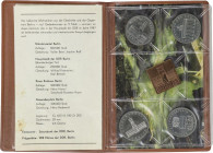 Serie 4 monedas 5 Mark. 1987. Anv.: KM-MSA16 (29, 114, 115, 116). CuNi. Aniversario Fundación de Berlín. En carterita oficial con jetón conmemorativo....