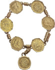 Lote 7 monedas 1/2 Libra. 1904, 1905 y 1908 (5). Peso total: 56,21 grs. AU. Engarzadas en una pulsera de oro (AU 700). Fr-74; KM-209. MBC+.