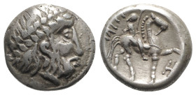 Celtic, Eastern Europe, imitating Philip II of Macedon, c. 3rd century BC. AR Tetradrachm (23.5mm, 12.66g, 11h). Laureate head of Zeus r. R/ Rider on ...