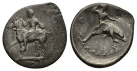 Southern Apulia, Tarentum, c. 405-400 BC. AR Nomos (24mm, 7.71g). Warrior on horse cantering l. holding shield. R/ Phalanthos riding dolphin r., holdi...