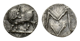 Southern Lucania, Sybaris, c. 550-510 BC. AR Obol (9mm, 0.36g). Bull standing l., head r. R/ Large MV monogram. HNItaly 1739; SNG ANS 854. VF
