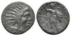 Sicily, Aitna, c. 210-150 BC. Æ Tetras (19mm, 4.45g, 11h). Radiate head of Helios r. R/ Warrior standing l., head r., holding spear and shield; [three...