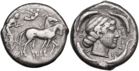 Sicily, Syracuse, 466-405 BC. AR Tetradrachm (24.5mm, 16.50g). Charioteer driving walking quadriga r., holding kentron and reins; Nike flying above cr...