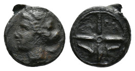 Sicily, Syracuse, c. 415-405 BC. Æ Hemilitron (15mm, 3.29g). Head of Arethusa l., hair in sphendone; dolphin behind. R/ Wheel of four spokes; dolphins...