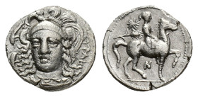 Sicily, Syracuse, 344-317 BC. AR Hemidrachm (14mm, 1.94g). Helmeted head of Athena facing slightly l.; three dolphins around. R/ Horseman riding r.; s...