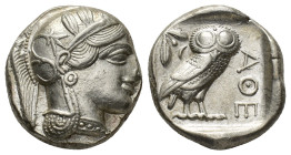 Attica, Athens, c. 454-404 BC. AR Tetradrachm (22mm, 17.18g). Helmeted head of Athena r. R/ Owl standing r., head facing; olive sprig behind; all with...