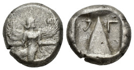Caria, Kaunos, c. 410-390 BC. AR Stater (21mm, 11.58g). Winged female figure in kneeling-running stance l., head r., holding kerykeion and wreath. R/ ...