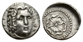 Islands of Caria, Rhodos. Rhodes, c. 88/42 BC-AD 14. AR Drachm (17mm, 3.28g). Radiate head of Helios facing slightly r. R/ Rose seen from above; above...