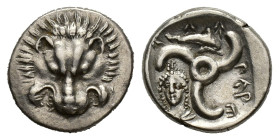 Dynasts of Lycia, Perikles (c. 380-360 BC). AR Tetrobol (16mm, 3.05g). Uncertain mint. Facing scalp of lion. R/ Triskeles; above, dolphin r.; to lower...