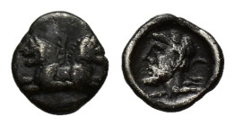 Dynasts of Lycia, Uncertain dynast, c. 5th-4th century BC. AR Hemibol (8mm, 0.31g). Double-bodied lion. R/ Head of Herakles l. within incuse square. M...