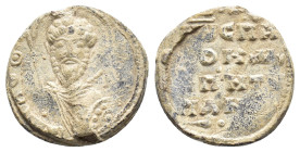 Byzantine PB Seal, c. 11th-12th century AD (22mm, 6.69g). Facing bust of St. Theodore, holding spear and shield. R/ Legend in four lines. VF