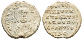 Byzantine PB Seal, c. 11th-12th century AD (28mm, 10.98g). Facing and nimbate bust of saint. R/ Legend in six lines. VF