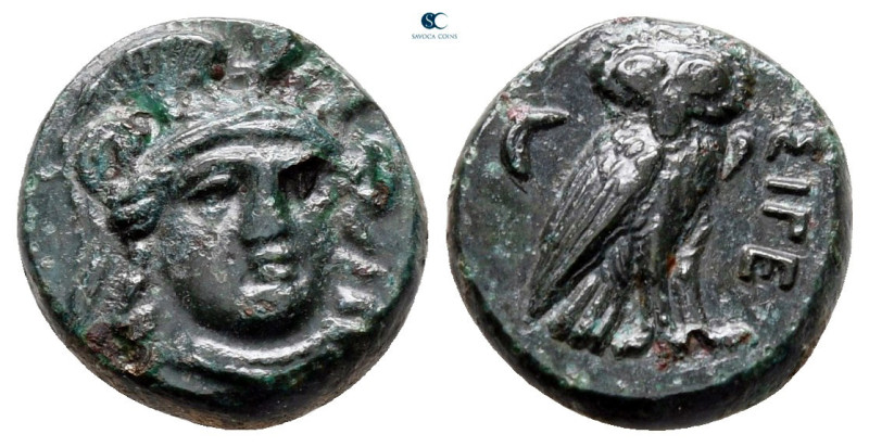 Troas. Sigeion circa 350-300 BC. 
Bronze Æ

12 mm, 2,10 g

Head of Athena f...