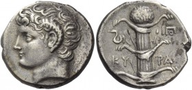Cyrene. Didrachm circa 308-277, AR 7.67 g. Head of Apollo Carneios l. Rev. KY – PA Silphium plant with four leaves; in l. field, coiled snake and in r...