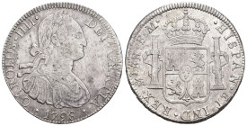 CARLOS IV. 8 reales. 1798. México. FM. AR 27 g. 39,7 mm. VI-794. Pequeños vanos. MBC/MBC+.