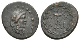 TROAS. Achaion. (Circa 2nd century BC).Ae. 3.92g 18.3m

Obv.Laureate head of Apollo to right. 
Rev. A-X/A-I Tripod within laurel wreath. 
RARE.