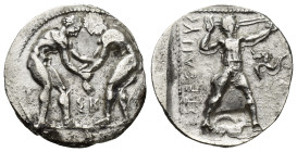 Pamphylia, Aspendos AR Stater. (22mm, 10.67 g) Circa 380-325 BC. Two wrestlers grappling; ΣK between / Slinger in throwing stance to right; EΣTFEΔIIY[...