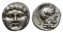 Pisidia, Selge. Ca. 350-300 B.C. AR obol (9mm, 0.96 g). Facing gorgoneion / Helmeted head of Athena right.