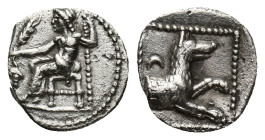 LYCAONIA, Laranda. Circa 324/3 BC. AR Obol (10mm, 0.64 g). Baal seated left, torso facing, holding grain ear and grape bunch in extended right hand, s...