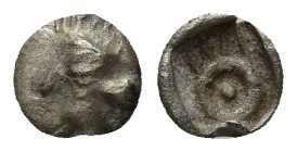 ASIA MINOR, Uncertain. 4th century BC. AR Fraction (6mm, 0.18 g). Crowned head (of Persian Great King?) left / Uncertain monogram or symbol.