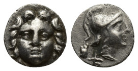 Pisidia, Selge. Ca. 350-300 B.C. AR obol (10mm, 0.81 g). Facing gorgoneion / Helmeted head of Athena right; behind, astralagos.