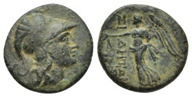 PAMPHYLIA, Side. Circa 1st Century BC. Æ (15mm, 2.77 g). Head of Athena right, wearing Corinthian helmet / Nike advancing left, holding wreath; pomegr...