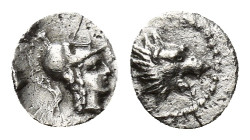PAMPHYLIA, Side. 2nd-1st century BC. AR (6mm, 0.15 g). Head of Athena right, wearing crested Corinthian helm / Head of roaring lion right.