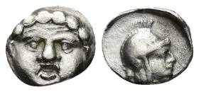 Pisidia, Selge. Ca. 350-300 B.C. AR obol (9mm, 0.92 g). Facing gorgoneion / Helmeted head of Athena right.