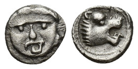 Pisidia, Selge AR Hemiobol. (7mm, 0.46 g) Circa 300-190 BC. Facing gorgoneion / Lion's head to right with mouth open.