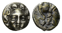Pisidia, Selge. Ca. 350-300 B.C. AR obol (9mm, 0.78 g). Facing gorgoneion / Helmeted head of Athena right; behind, astralagos.