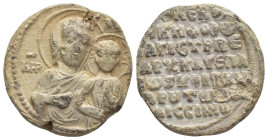 Byzantine Lead Seal (24mm, 12.98 g) Obv: Nimbate and draped half length bust of the Virgin Mary, facing slightly to right, presenting the youthful Chr...