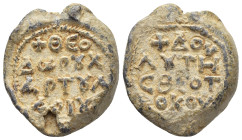 Byzantine Lead Seal (22mm, 14.79 g) Obv: Legend four lines. Rev: Legend four lines.