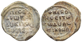 Byzantine Lead Seal (22mm, 10.66 g) Obv: Legend four lines. Rev: Legend four lines.
