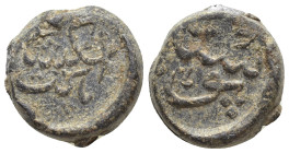 Islamic Lead Seal (18mm, 12.78 g) Obv: Legend in Arabic. Rev. Legend in Arabic.