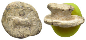 Lead Seal. (16mm, 8.66 g) Horse galloping to right, over monogram.
