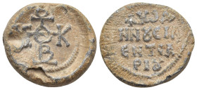 Byzantine Lead Seal (21mm, 12.51 g) Obv: Cruciform monogram. Rev: Legend four lines.