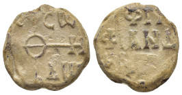 Byzantine Lead Seal (19mm, 6.84 g) Obv: Cruciform monogram. Rev: Legend three lines.