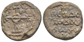 Byzantine Lead Seal (27mm, 20.64 g) Obv: Cruciform monogram. Rev: Legend three lines.