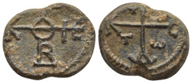 Byzantine Lead Seal (23mm, 11.90 g) Obv: Cruciform monogram. Rev: Cruciform monogram.