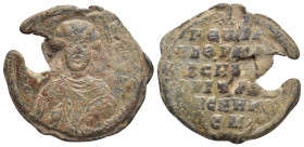Byzantine lead seal. (28mm, 12.71 g) Obv: Saint standing, in armor and a cloak, holding a spear in his right hand and a shield with his left. Rev: Leg...