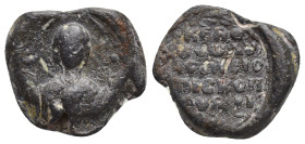 Byzantine Lead Seal (16mm, 4.78 g) Obv: Nimbate bust of the Virgin Mary, facing, between two crosses, holding a medallion of a facing head of Christ o...