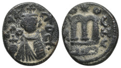 Arab-Byzantine, Umayyad Caliphate. temp. 'Abd al-Malik ibn Marwan (AH 65-86 / AD 685-705). Æ Fals (17mm, 4.22 g). Hims (Emesa), c. 685-690s. Crowned f...