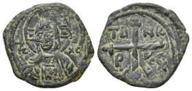 CRUSADERS, Antioch. Tancred. Regent, 1101-1112. Æ Follis (20mm, 3.46 g). Facing bust of Christ / Cross pommetée; pelleted floral decoration at base, T...