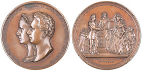 Louis Ier 1861-1889 et Marie Pie de Savoye
Grande médaille en Bronze, 1862 opus D. Canzani, AE 222.46 g. 74 mm
Avers : LUIZ I REI DE PORTUGAL E DOS AL...