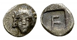 Kolophon AR Tetartemorion, c. 490-400 BC 

Ionia, Kolophon . AR Tetartemorion (5-6 mm, 0.27 g), c. 490-400 BC.
Obv. Laureate and veiled head of Apo...