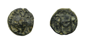 Ciudad indeterminada (¿Mérida? ¿Sevilla?). Siglos VI-VII dC. Nummus Anónimo. 1,1 gr. AE. Anv: Busto a derecha y leyenda CI-VI. Rev: Monograma indeterm...