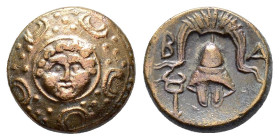 KINGS OF MACEDON. Philip III Arrhidaios (323-317 BC).Salamis.Ae.

Obv : Macedonian shield, with facing gorgoneion on boss.

Rev : B - A.
Helmet; keryk...
