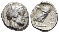 ATTICA. Athens.(Circa 454-404 BC).Tetradrachm.

Obv : Helmeted head of Athena to right.

Rev : AΘE.
Owl standing right, head facing; olive sprig ...