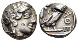 ATTICA.Athens.(Circa 454-404 BC).Tetradrachm.

Obv : Helmeted head of Athena right.

Rev : AΘE.
Owl standing right, head facing; olive sprig and cresc...